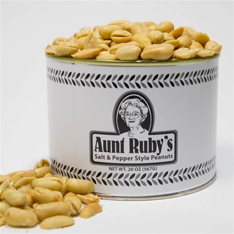 Aunt ruby's peanuts - Aunt Ruby’s appears to be the only open business in the neighborhood, near the railroad tracks. A long table as soon as you walk in, has open containers of nuts, mostly varieties of peanuts, plus almonds and cashews. I was invited to sample as many as I wanted. Two varieties of chocolate covered nuts were available.